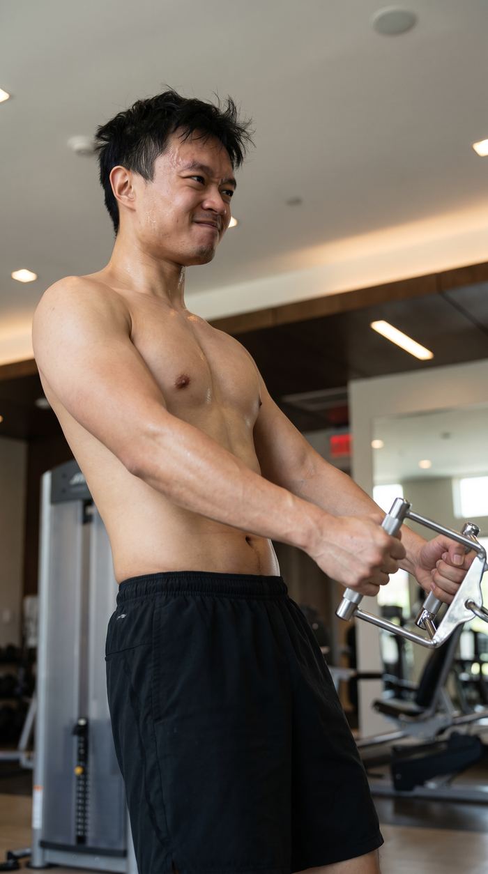 UGC style photo of a man training at the gym