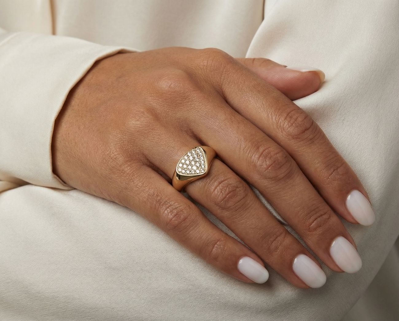 Same triangle ring worn on a hand