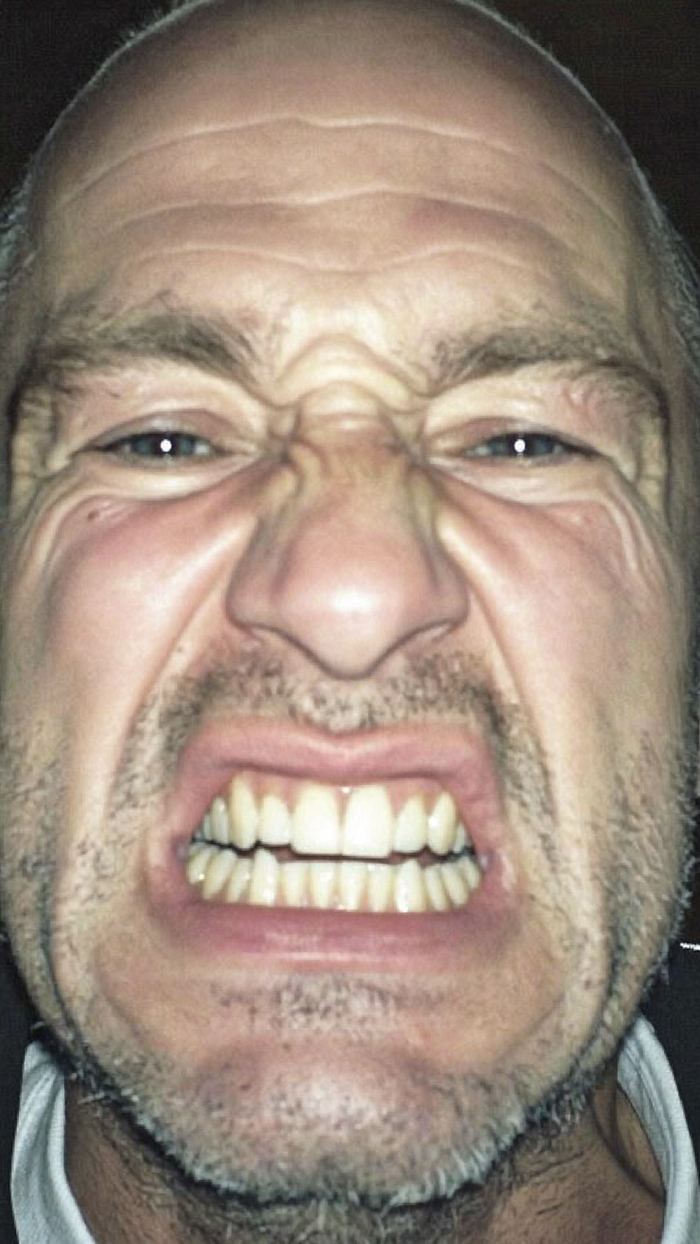 UGC style close-up of a man grimacing