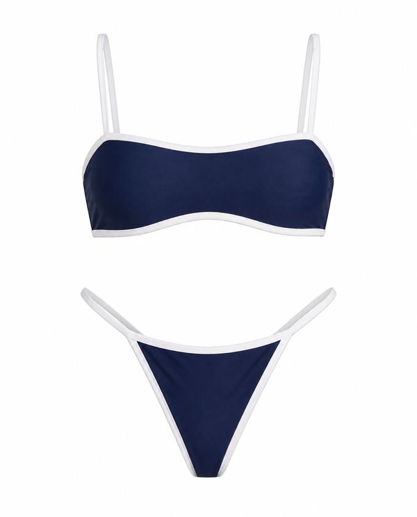 Navy bikini flat lay on white